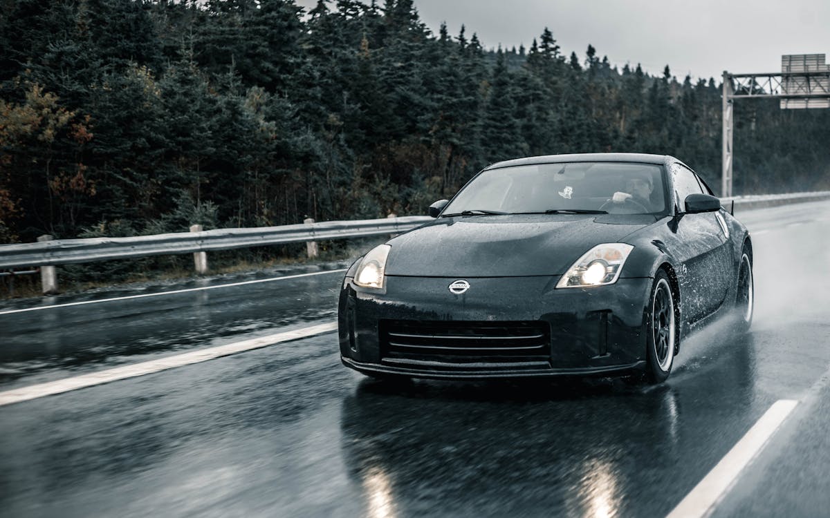 car driving rain landscape